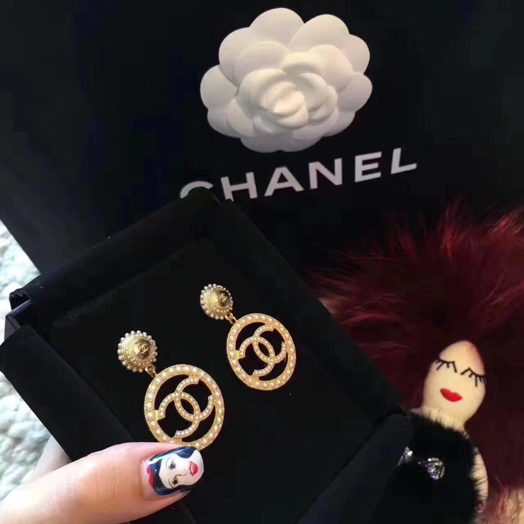 Gold pearl earrings