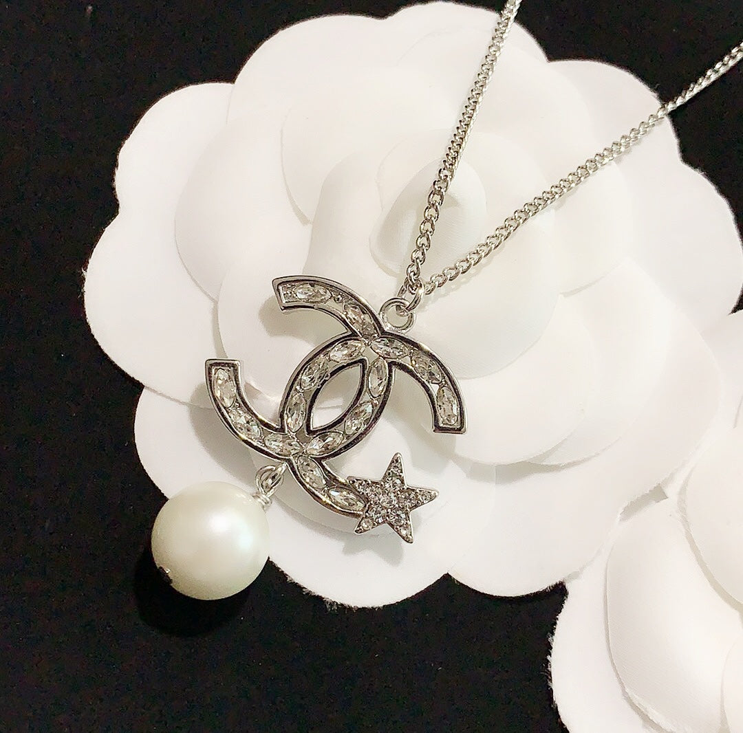 pentagram pearl earrings