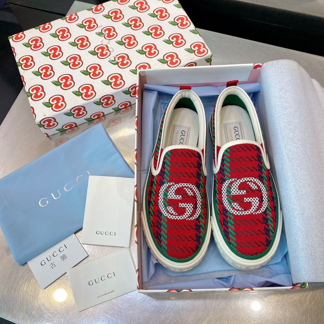 G u c c I slip ons