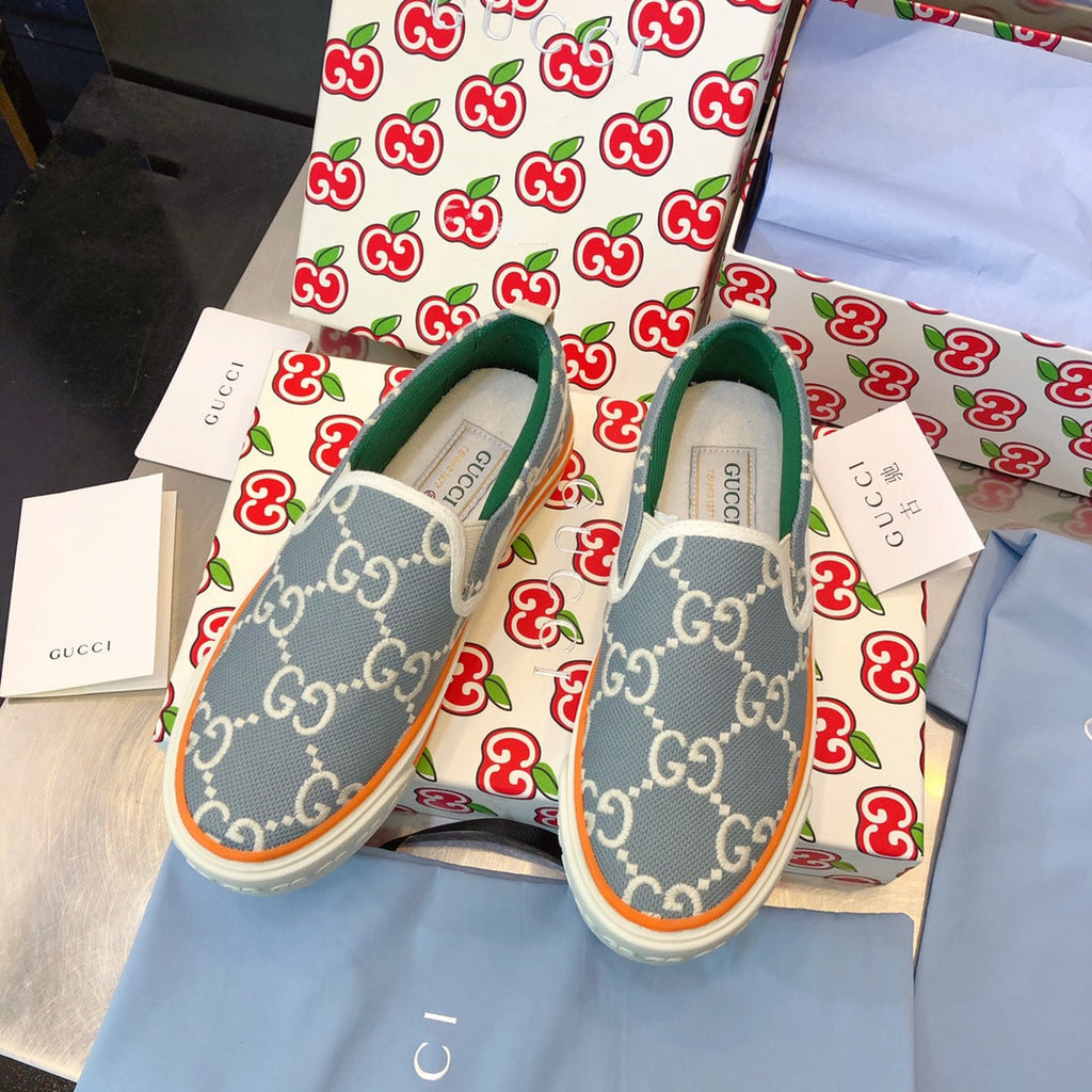 G u c c I baja slip on