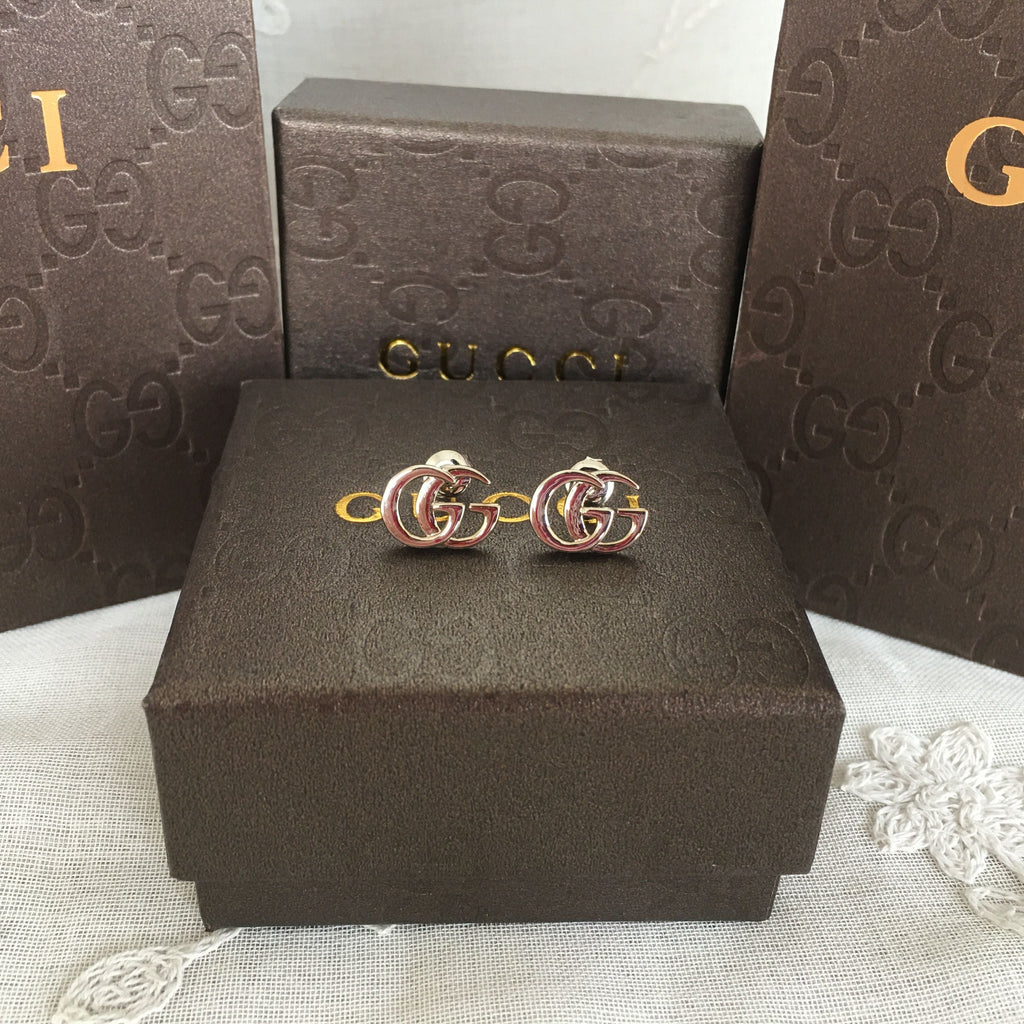 G u c c I earrings
