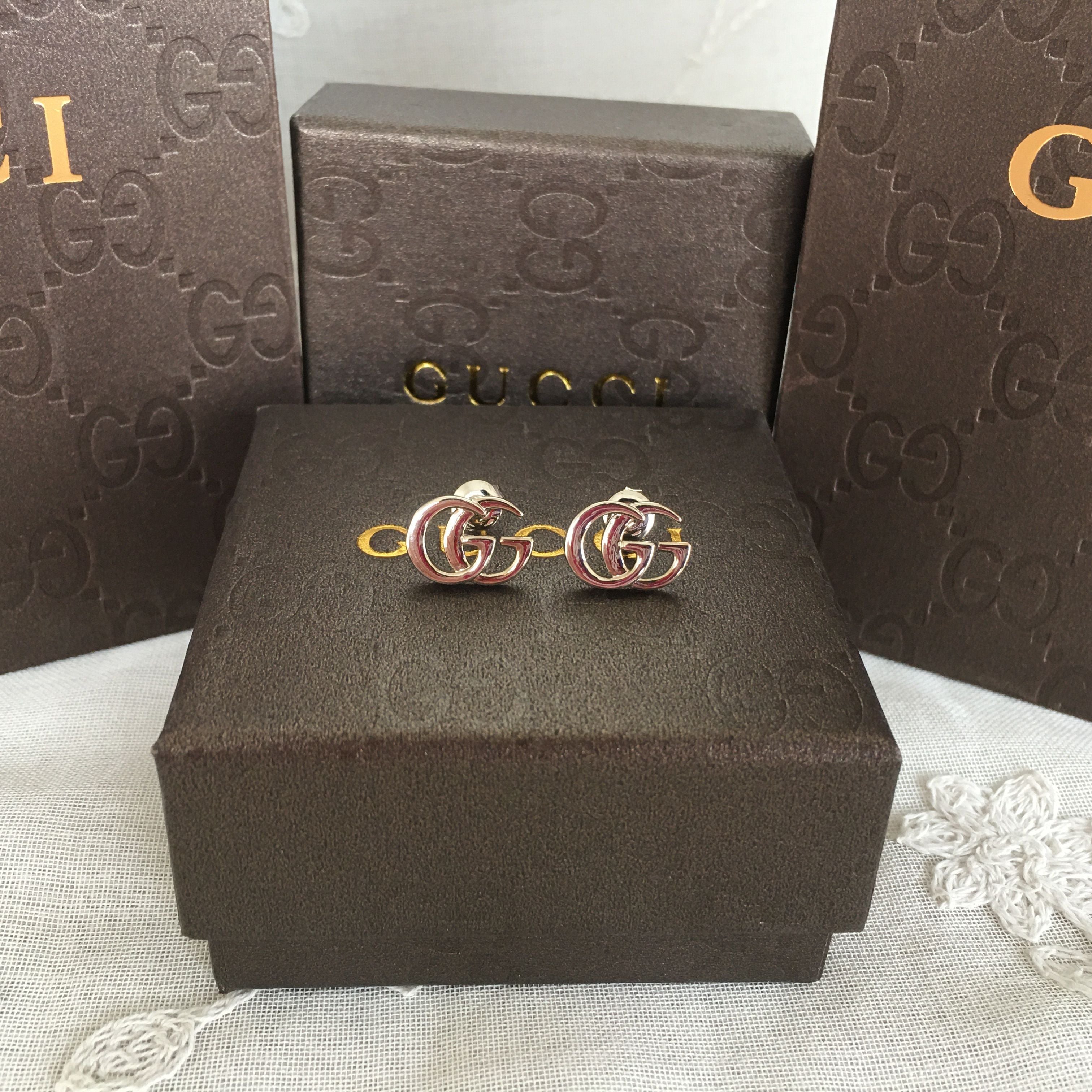 G u c c I earrings
