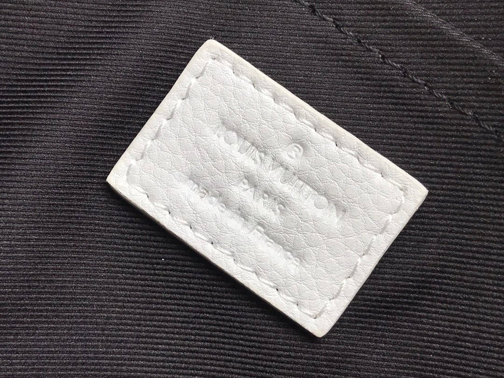 Monogram Empreinte white