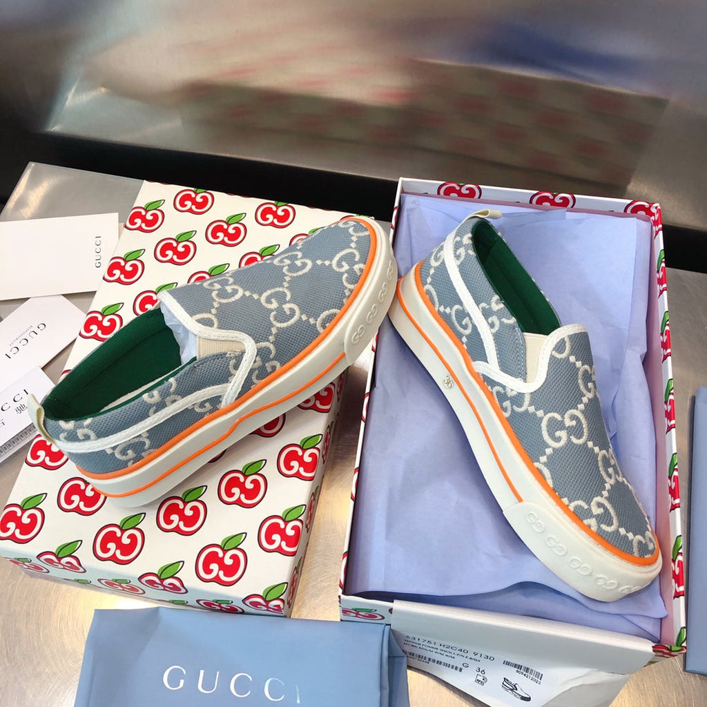 G u c c I slip ons