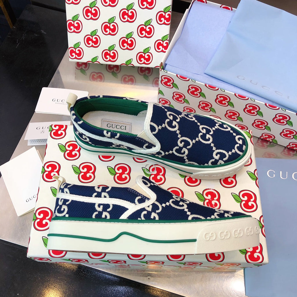 G u c c I slip ons