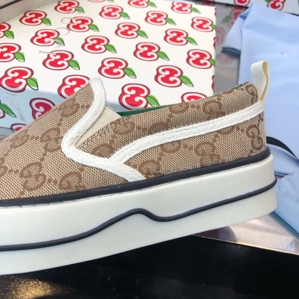 G u c c I slip ons