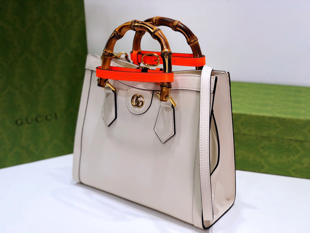 G u c c i white 20x 16x 10 or 27x 24x 11
