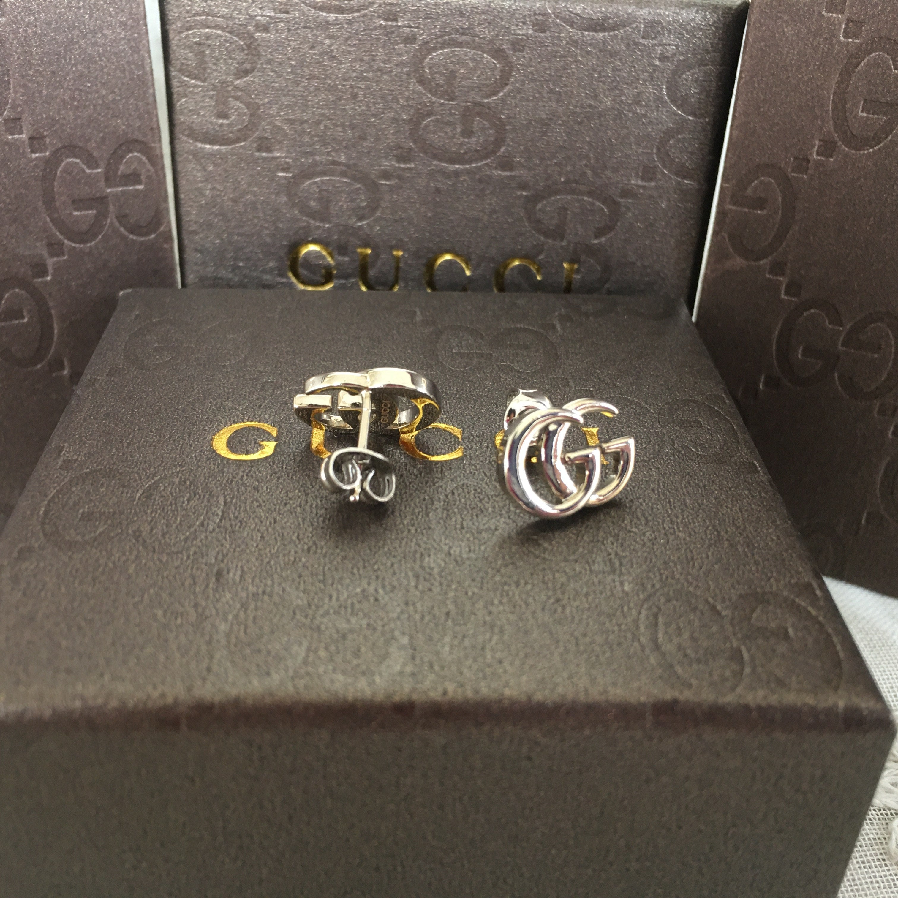 G u c c I earrings