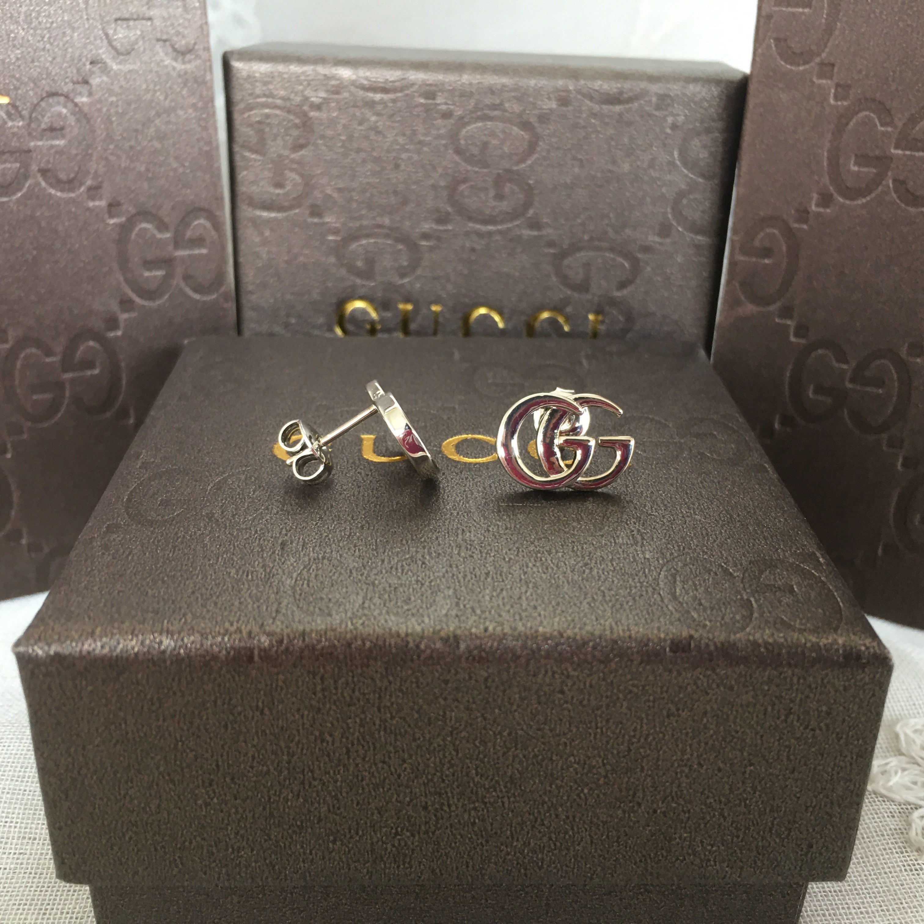 G u c c I earrings