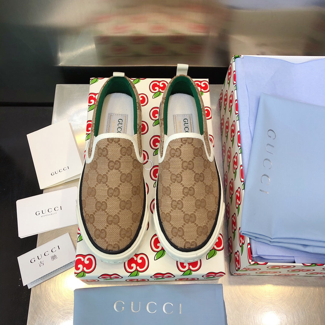 G u c c I slip ons