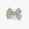 18K CC 25K Bow Tie Diamond Brooch
