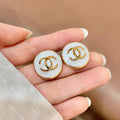 18K CC Black & White Round Gold Earrings